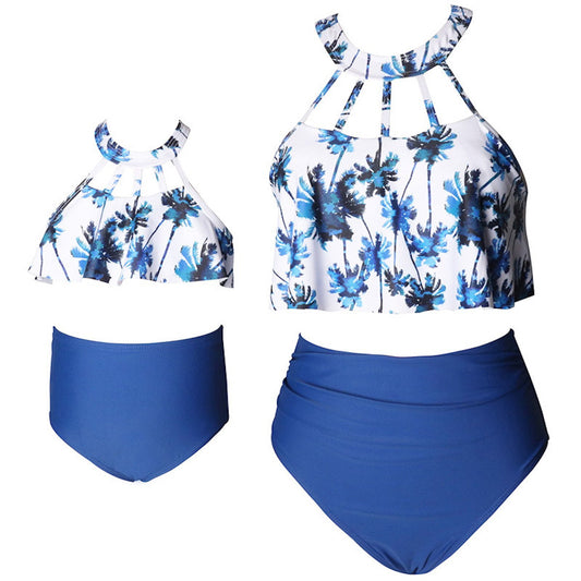 Two-piece swimsuit with floral top and blue high-waisted bottom - ChildAngle