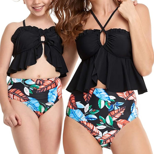 Mommy and Me matching black ruffled swimsuits with colorful leaf patterns - ChildAngle