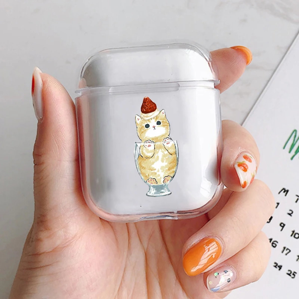 Clear air pod case with a cat design 