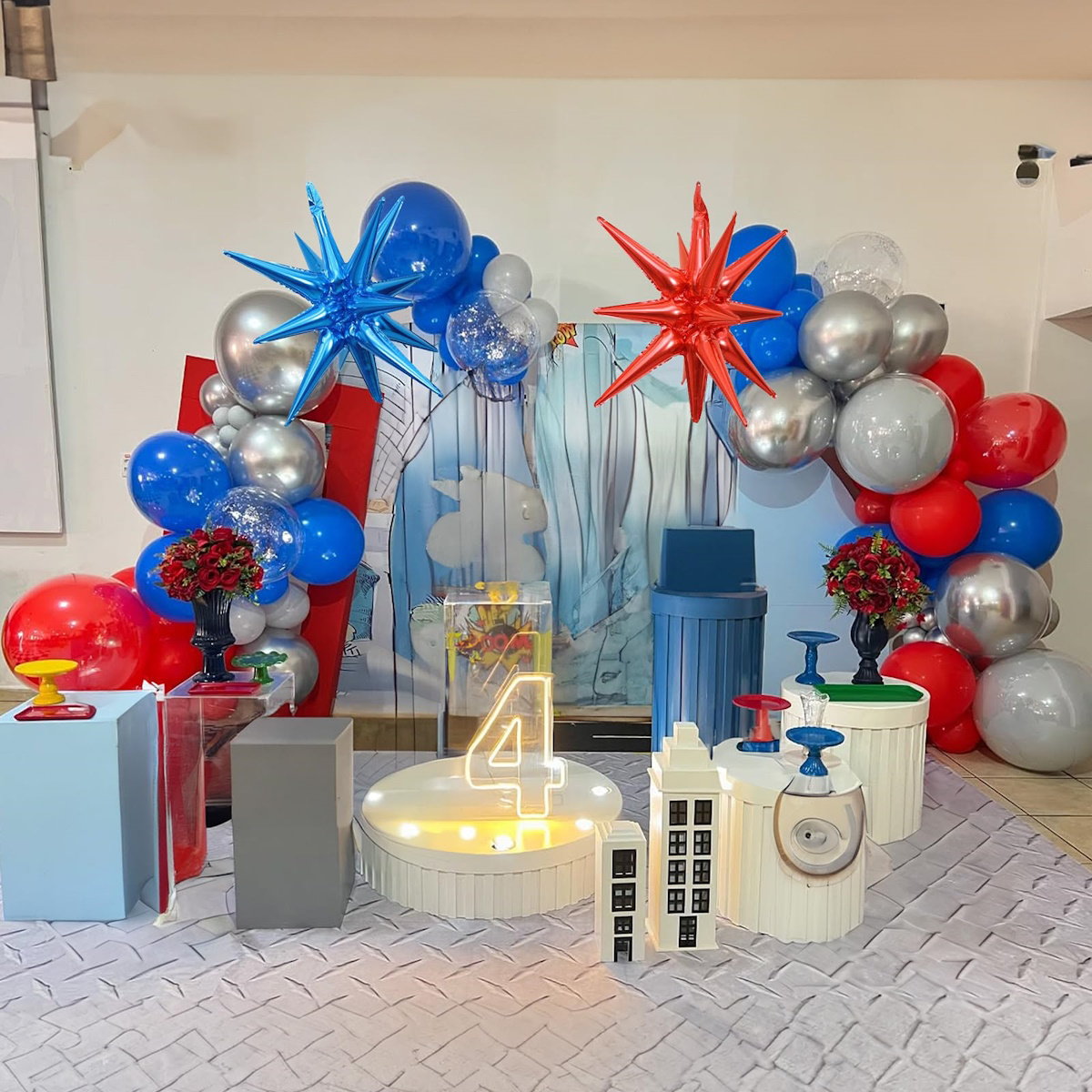 Starburst colorful balloon arch with red, blue, and silver balloons - ChildAngle Starburst 4th of July Balloons Garland