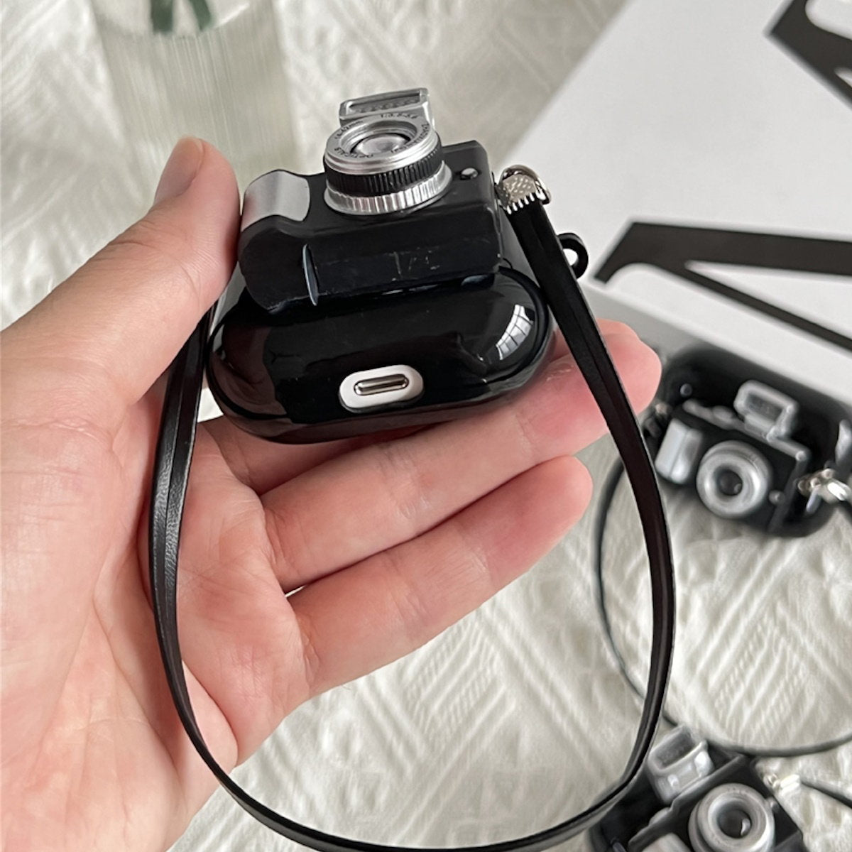 Camera-shaped AirPods case - ChildAngle