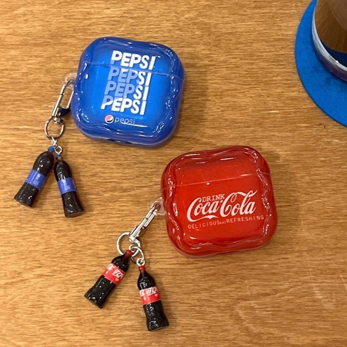 Red Coca-Cola and Pepsi AirPods case - ChildAngle