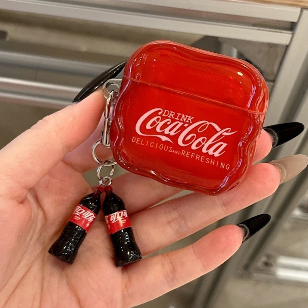 Red Coca-Cola and Pepsi AirPods case - ChildAngle