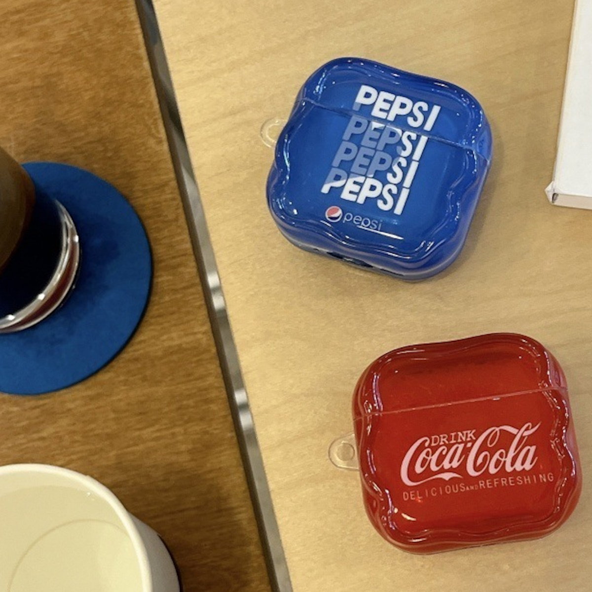 Red Coca-Cola and Pepsi AirPods case - ChildAngle