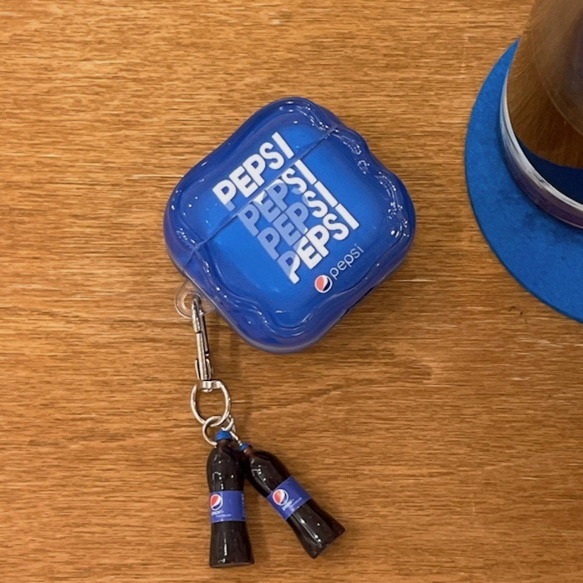 Red Coca-Cola and Pepsi AirPods case - ChildAngle