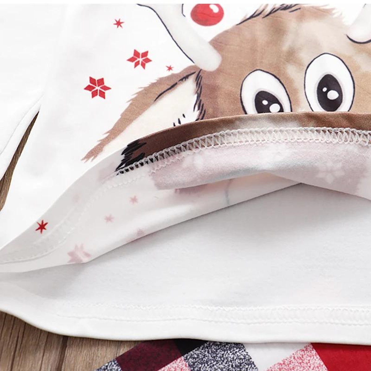 Christmas-themed pajama set with reindeer design and plaid pants - ChildAngle Family Matching Pajama Set