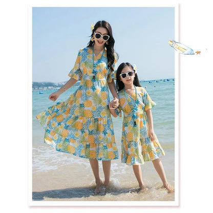 Two women in matching pineapple-patterned dresses  Pineapple Family Matching Outfits - ChildAngle
