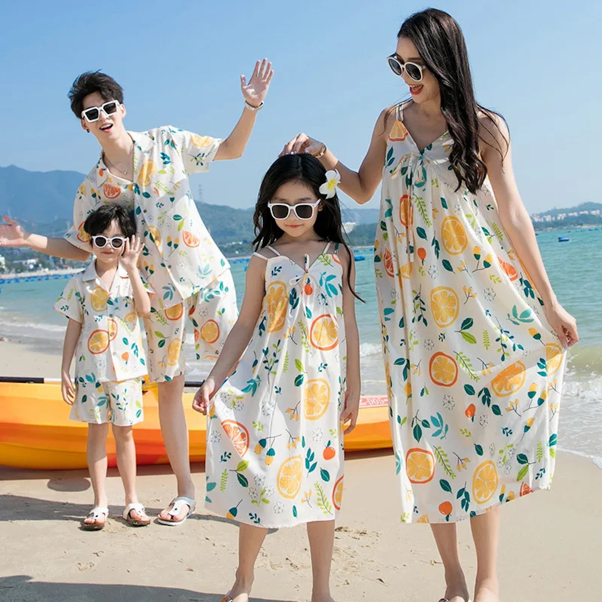 Family of four wearing matching outfits with fruit patterns  - ChildAngle Family Matching Outfits Set