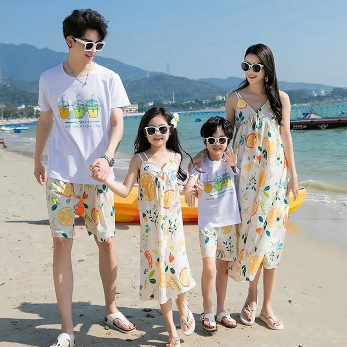 Family of four wearing matching outfits with fruit patterns  - ChildAngle Family Matching Outfits Set