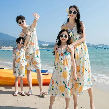 Family of four in matching outfits with fruit patterns  - ChildAngle Family Matching Outfits Set