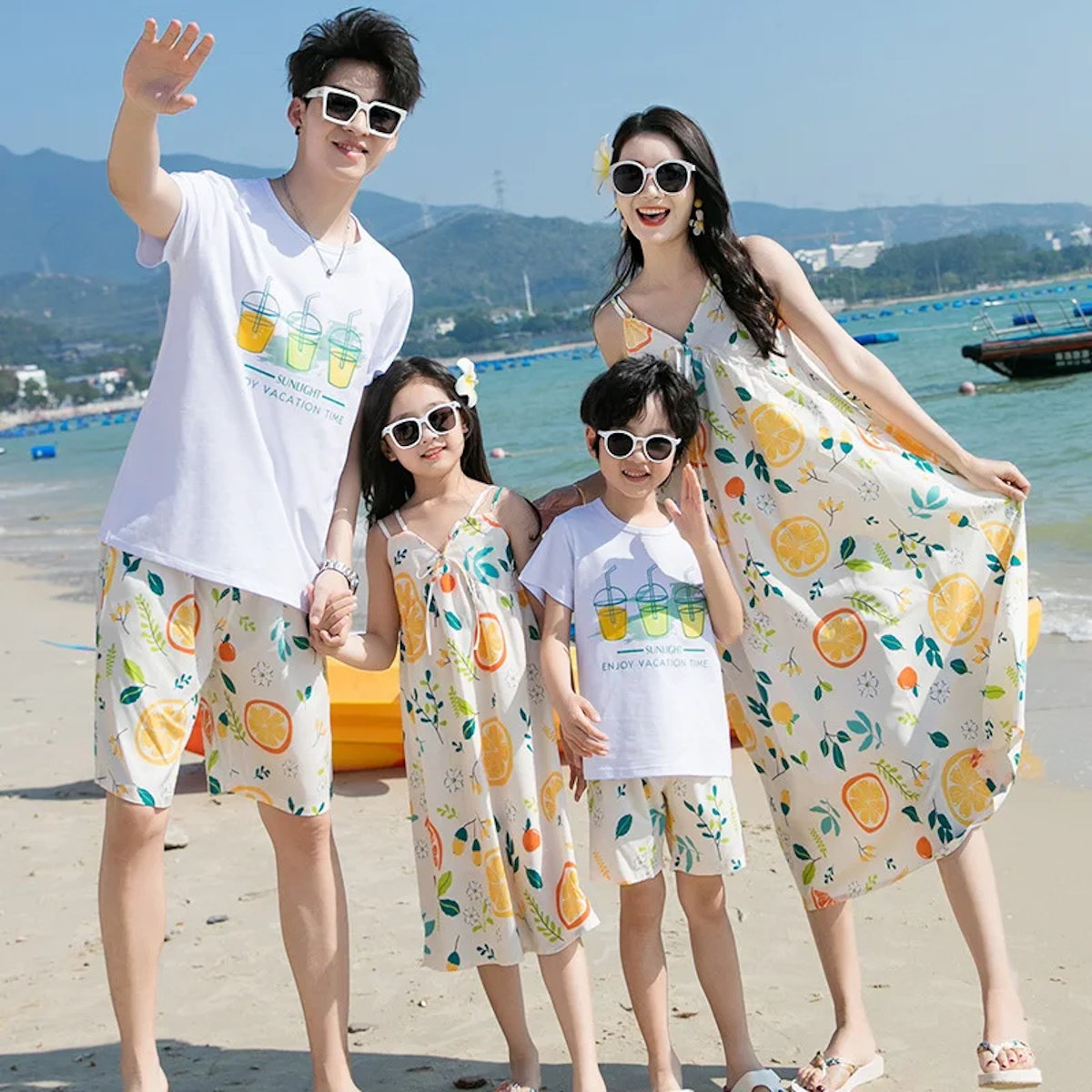 Family of four with matching outfits featuring fruit patterns - ChildAngle Family Matching Outfits Set