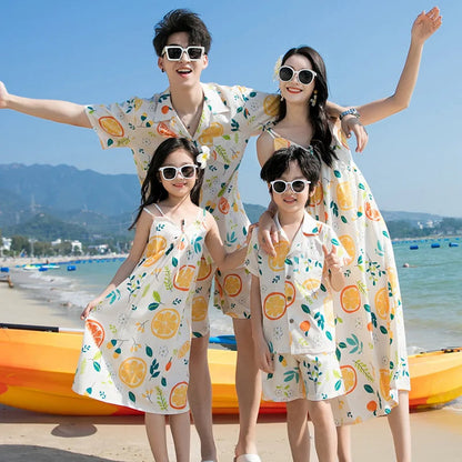 Family of four wearing matching outfits with fruit pattern  - ChildAngle Family Matching Outfits Set