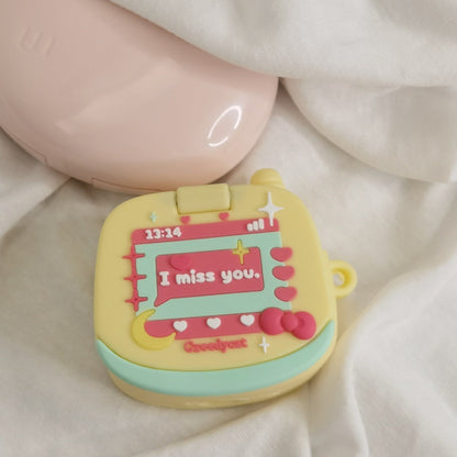 Yellow toy phone AirPods case - ChildAngle