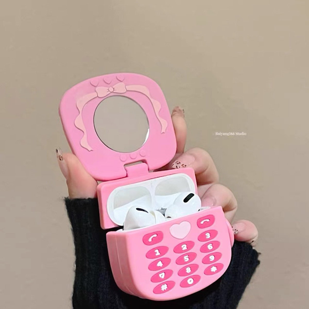 Pink toy phone AirPods case - ChildAngle