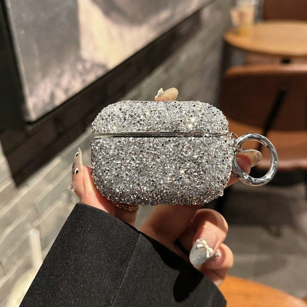Silver glittery AirPods case - ChildAngle