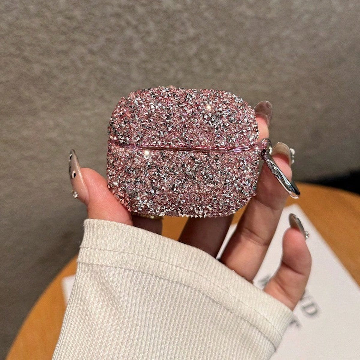 Silver glittery AirPods case - ChildAngle
