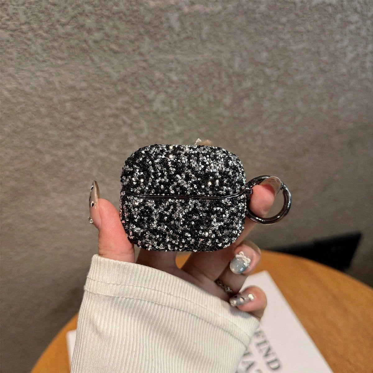 Silver glittery AirPods case - ChildAngle