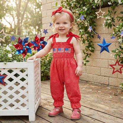 Child in a red checkered outfit with American flags - ChildAngle 4th of July Baby Romper