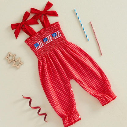 Child in a red checkered outfit with American flags - ChildAngle 4th of July Baby Romper