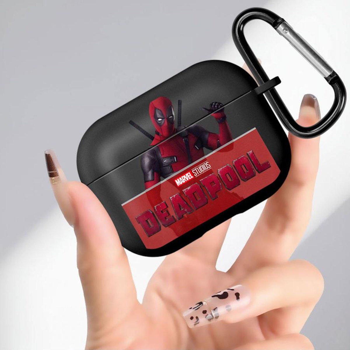Black AirPods case with Marvel Deadpool design - ChildAngle Deadpool AirPods Case