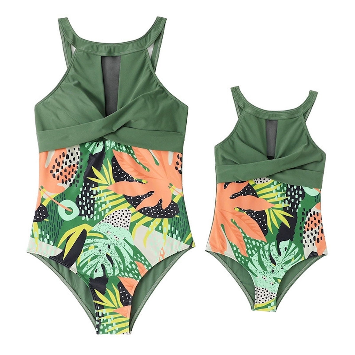 Green one-piece swimsuit with tropical leaf pattern on a white background