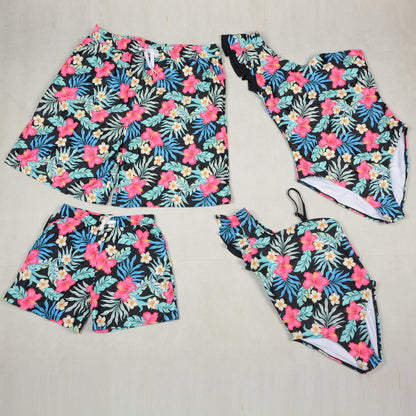 Floral swimwear set on a gray background