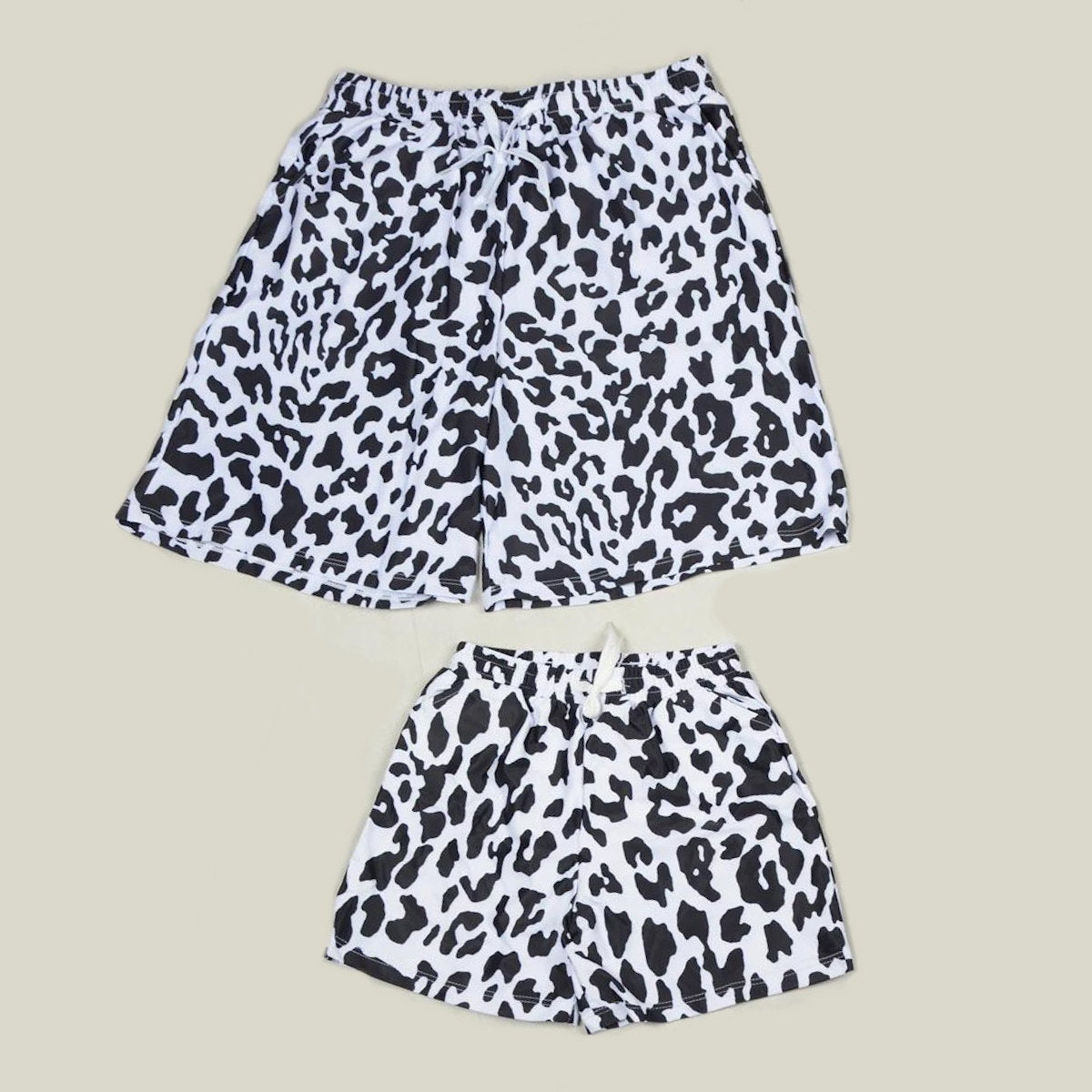 Pair of leopard print shorts on a beige background