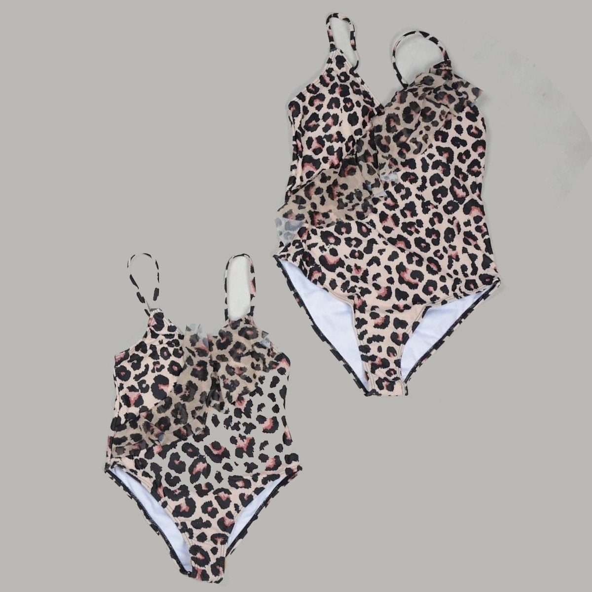Leopard print swimsuit set on a gray background