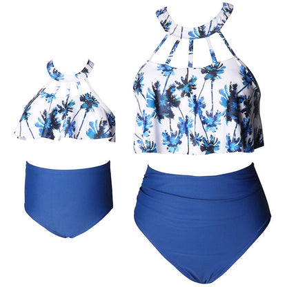 Two-piece swimsuit with floral top and blue high-waisted bottom - ChildAngle
