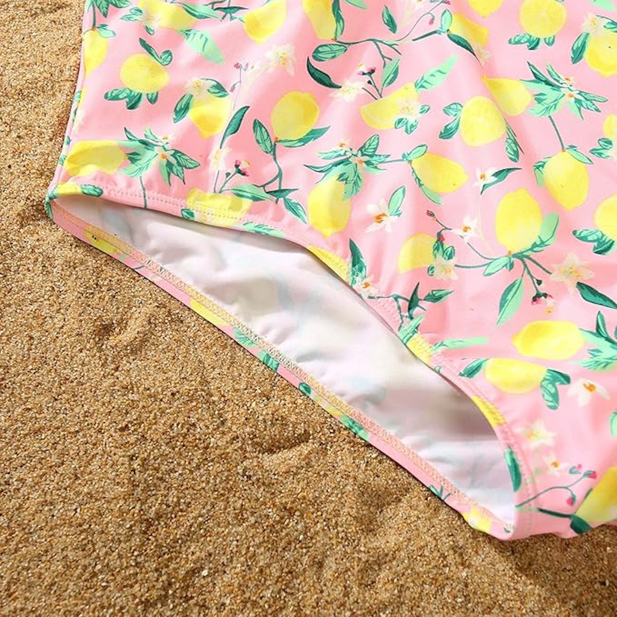 Pink swimsuit with lemon and flower pattern - ChildAngle