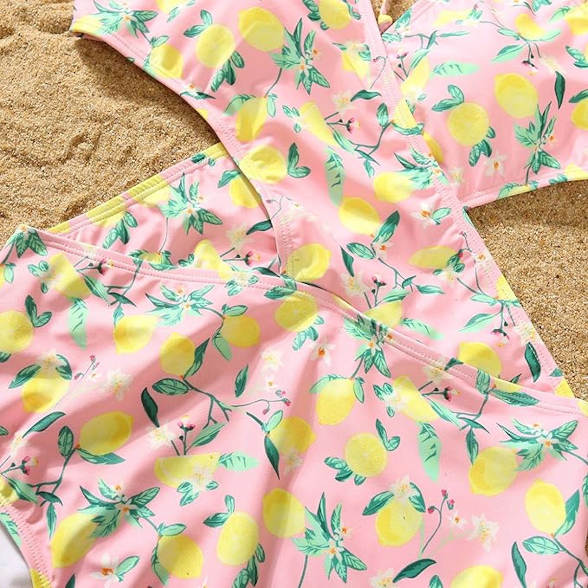Pink swimsuit with lemon and leaf pattern - ChildAngle