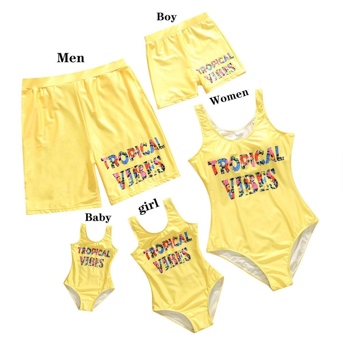 Yellow swimwear set with 'Tropical Vibes' text for men, women, baby, and girl on a white background.