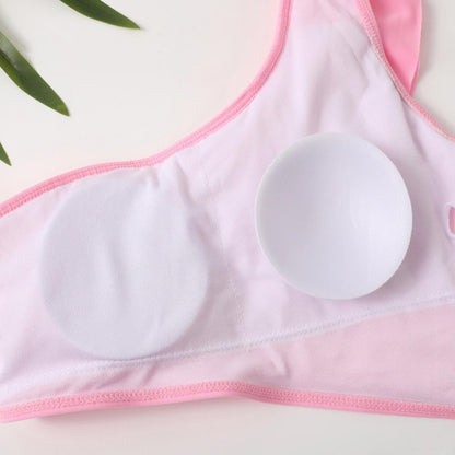 White adhesive patch on a pink bra with green leaves - ChildAngle