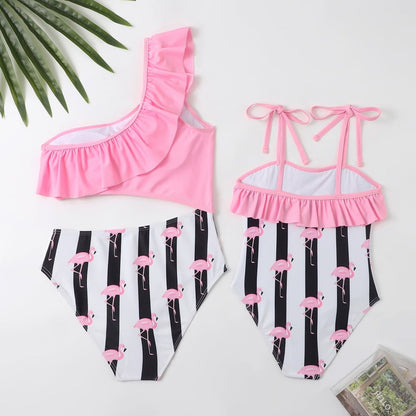 Two swimsuits, one pink and one with flamingo pattern - ChildAngle