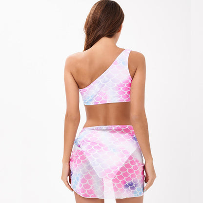 Woman wearing a colorful mermaid scale patterned two-piece outfit - ChildAngle