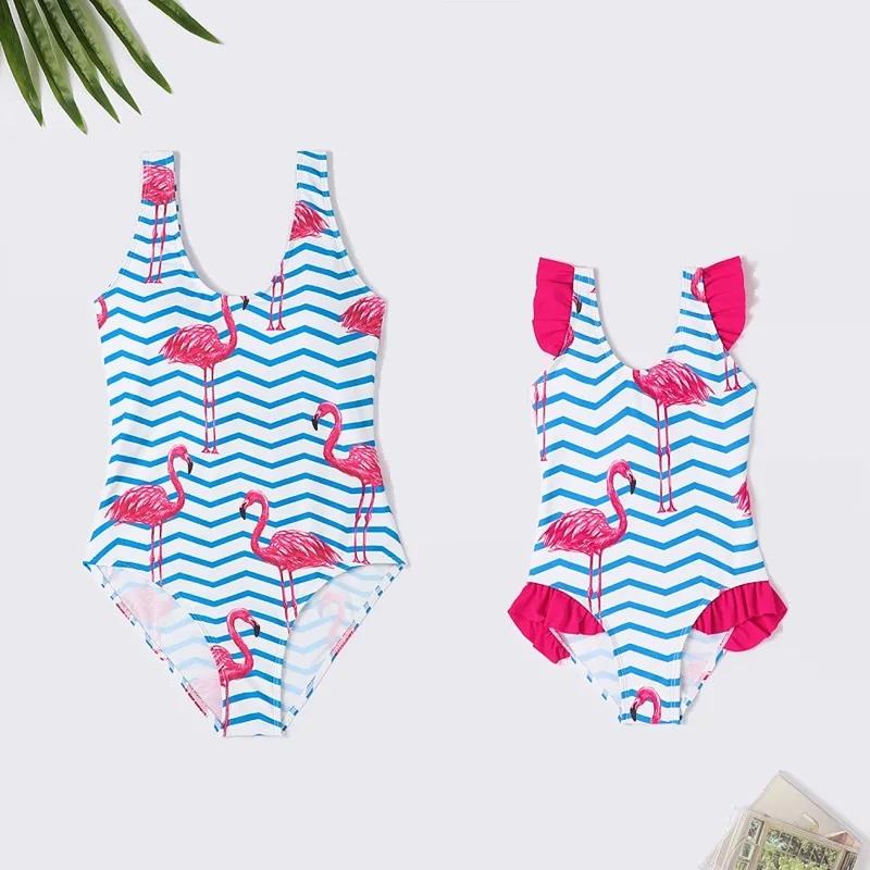 Two children's swimsuits with flamingo pattern One Piece Swimwear - ChildAngle
