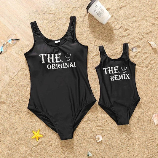 Black swimsuits with 'The Original' and 'The Remix' text Mommy and Me Matching One Piece Swimwear - ChildAngle