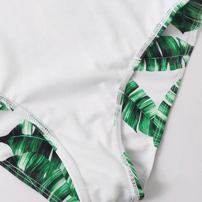 Close-up of a green leaf patterned bikini bottom - ChildAngle