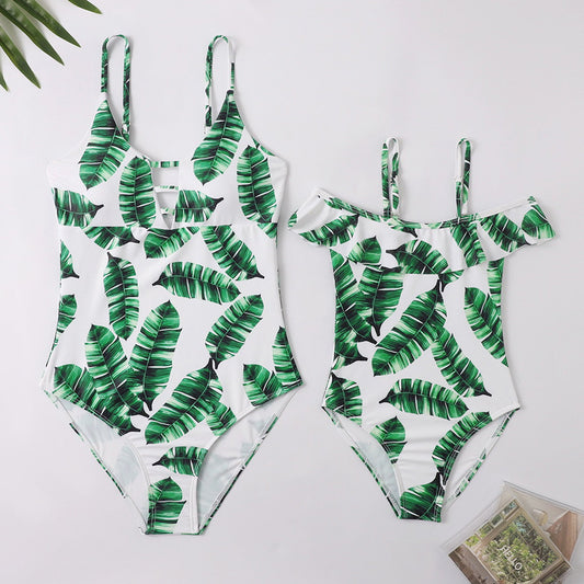 Two green leaf-patterned swimsuits - ChildAngle