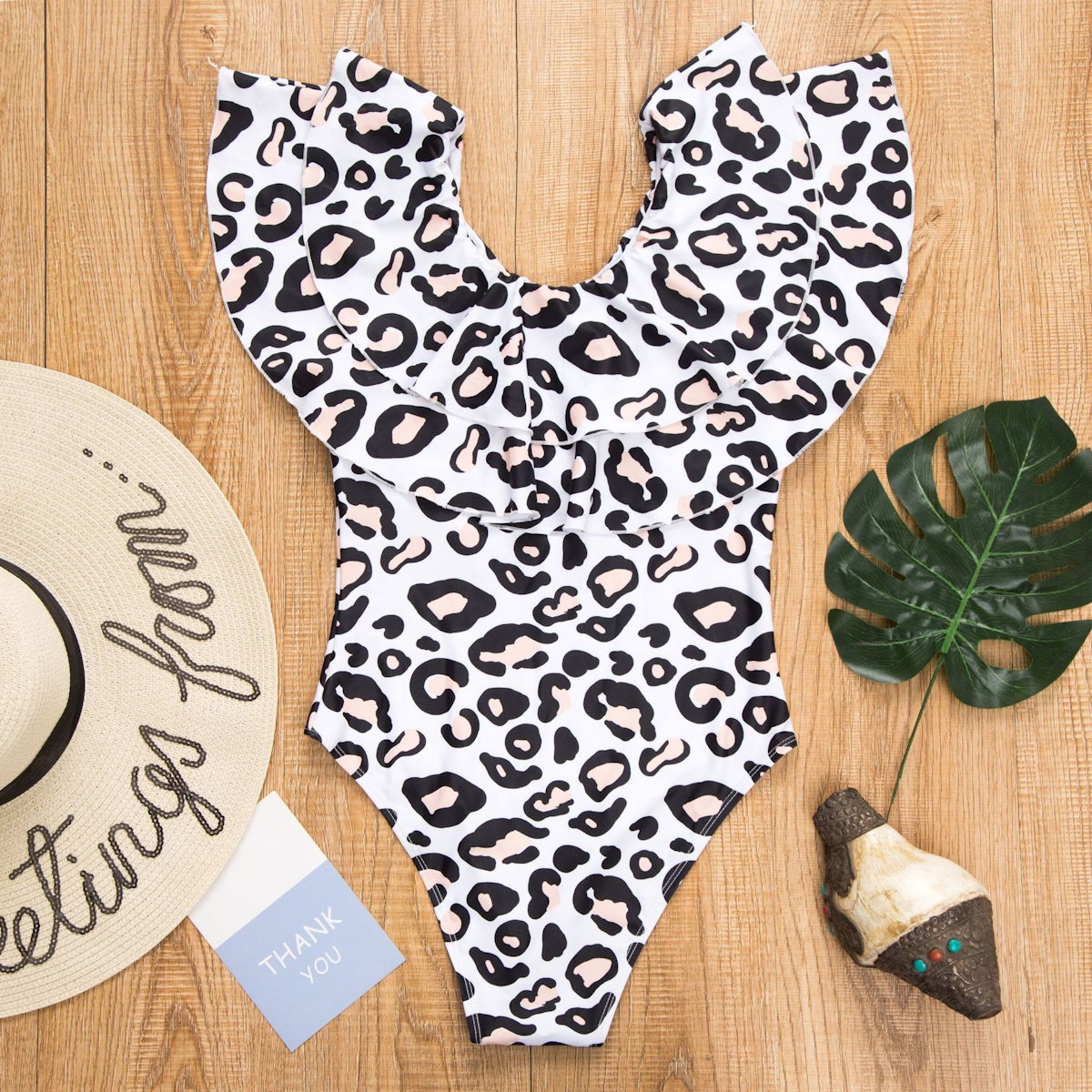 Leopard print swimsuit form Mommy and Me - ChildAngle