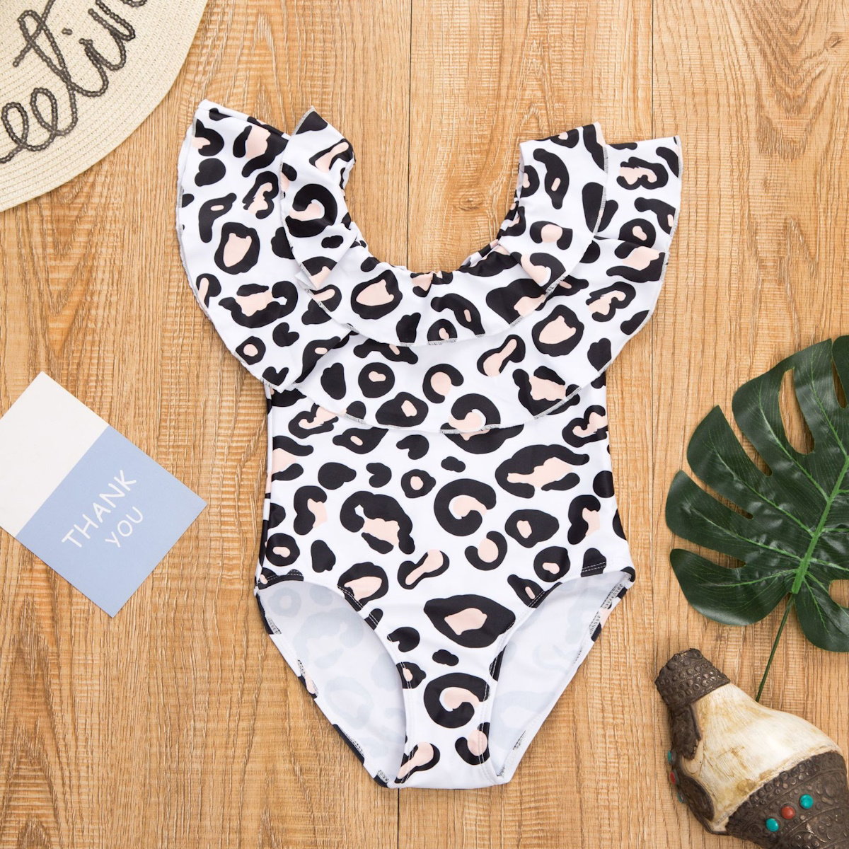 Leopard print swimsuit form Mommy and Me - ChildAngle