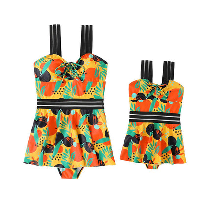 Two colorful swimsuits with tropical patterns - ChildAngle