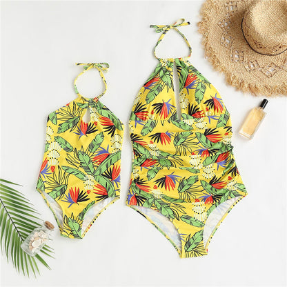 Mommy and Me Yellow one piece swimsuit with tropical leaf pattern - ChildAngle