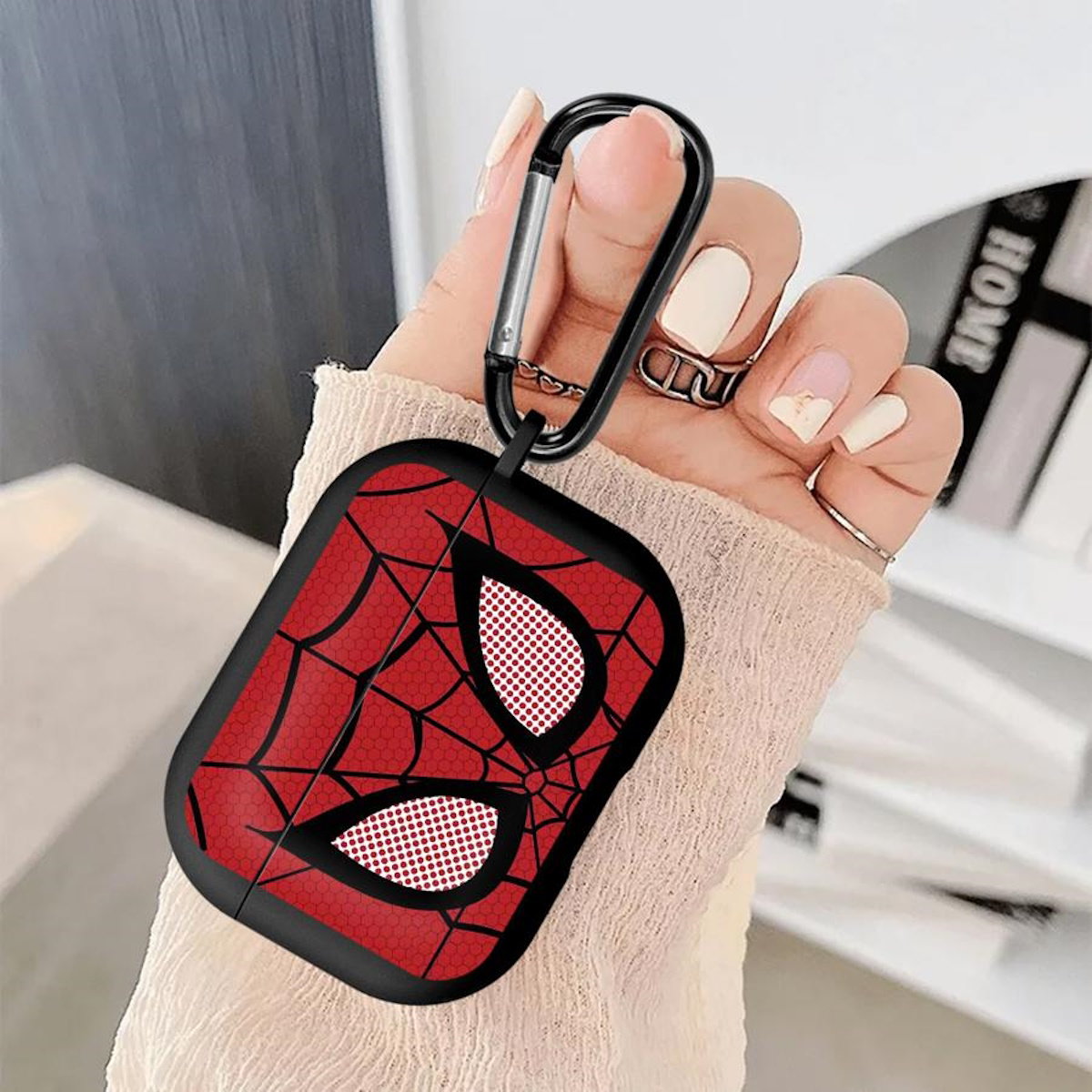 Spider-Man themed carabiner with a red and black design.