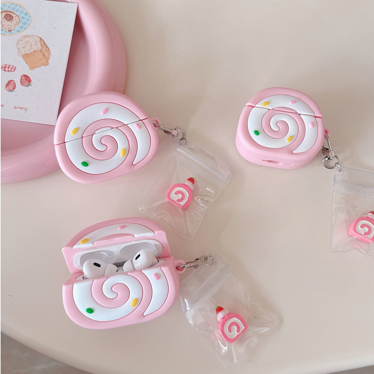 Pink Swiss Roll-shaped AirPods case - ChildAngle